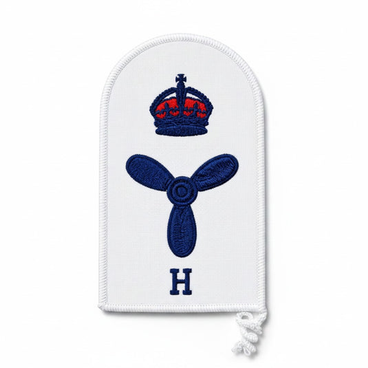 Cadetshop Marine Technical Hull category badge with embroidered crown, propeller, and H letter on white fabric