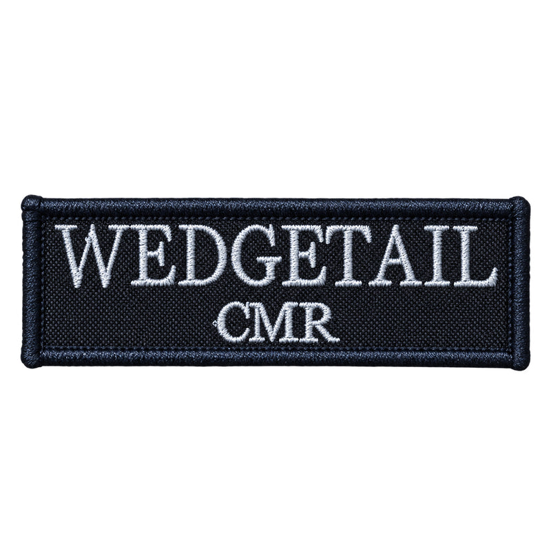 Load image into Gallery viewer, Black embroidered patch with white thread lettering reading ’wedgetail cmr’
