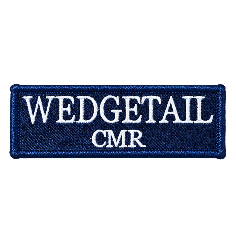 Load image into Gallery viewer, Navy blue embroidered patch with white stitched lettering reading ’wedgetail cmr’

