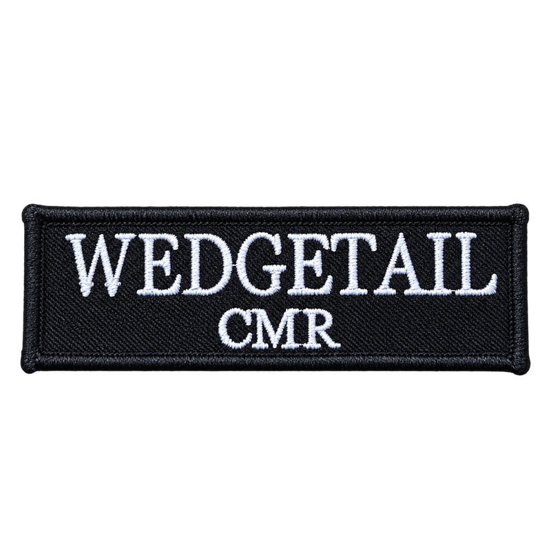 Load image into Gallery viewer, Black embroidered patch with white stitched text reading ’wedgetail’ above ’cmr’
